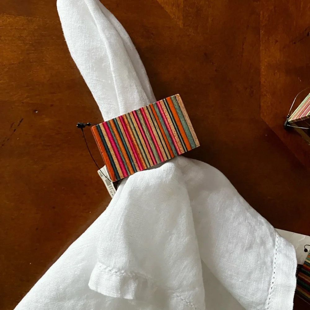 Set of 8 Multicolored Striped Wooden Napkin Rings. Napkin is not included.
